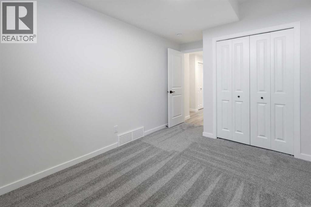 410 Carringvue Grove Nw, Calgary, Alberta  T3P 2L9 - Photo 30 - A2343642