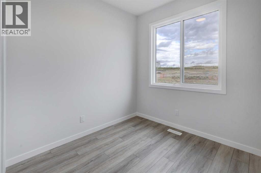 410 Carringvue Grove Nw, Calgary, Alberta  T3P 2L9 - Photo 10 - A2343642