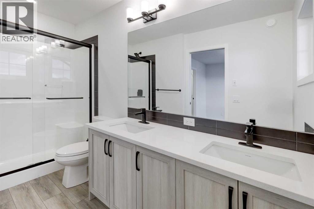 410 Carringvue Grove Nw, Calgary, Alberta  T3P 2L9 - Photo 16 - A2343642