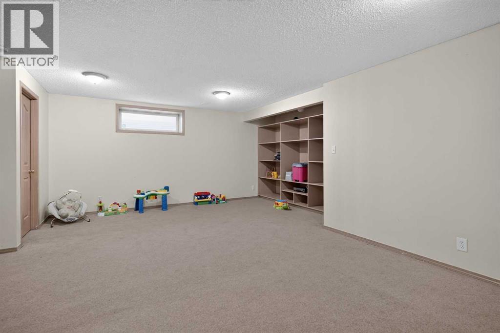 373 Bridlewood Avenue Sw, Calgary, Alberta  T2Y 4H5 - Photo 34 - A2344744