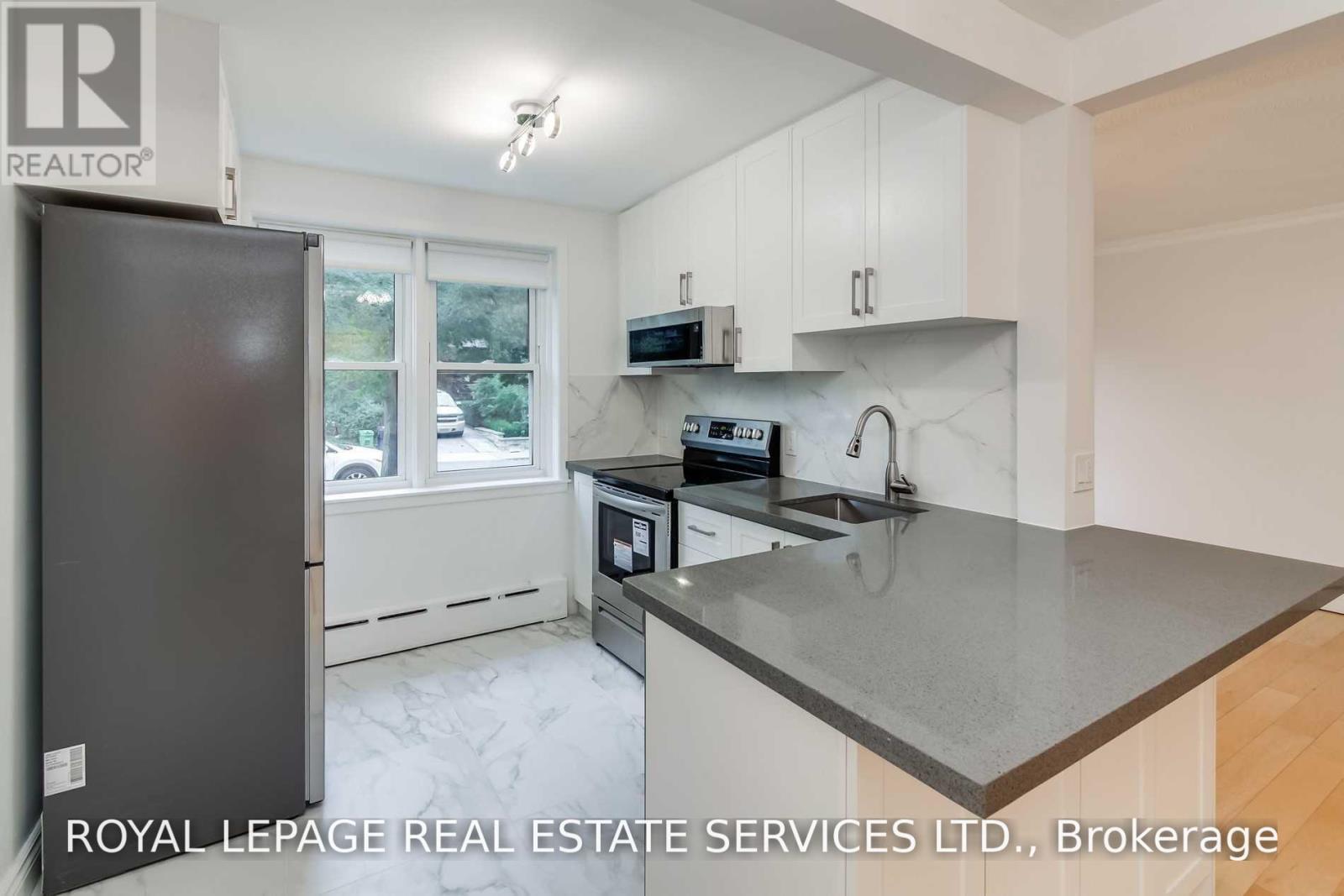 Suite 1 - 48 Indian Road Crescent, Toronto, Ontario  M6P 2G1 - Photo 4 - W13827720
