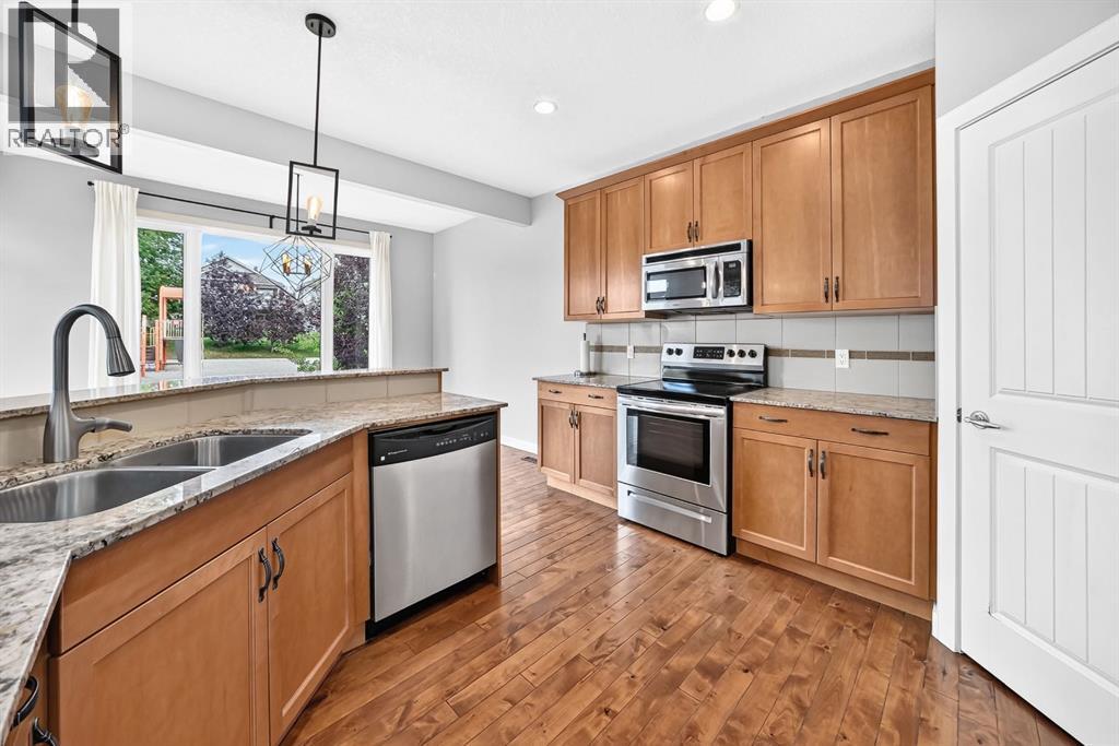 176 Sunset Circle, Cochrane, Alberta T4C 0C4 - Photo 6 - A2346136