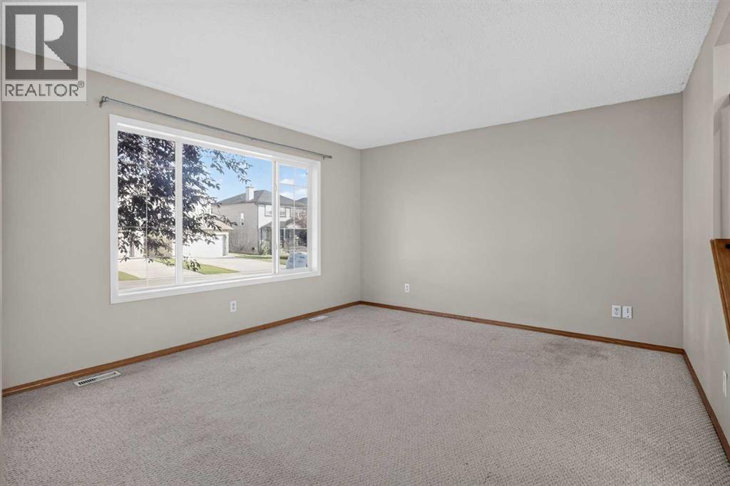 184 Everridge Way Sw, Calgary, Alberta  T2Y 4S9 - Photo 8 - A2346437
