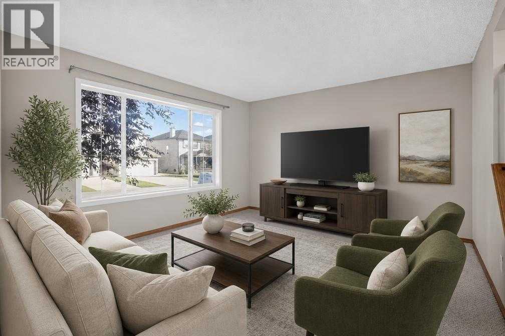 184 Everridge Way Sw, Calgary, Alberta  T2Y 4S9 - Photo 7 - A2346437