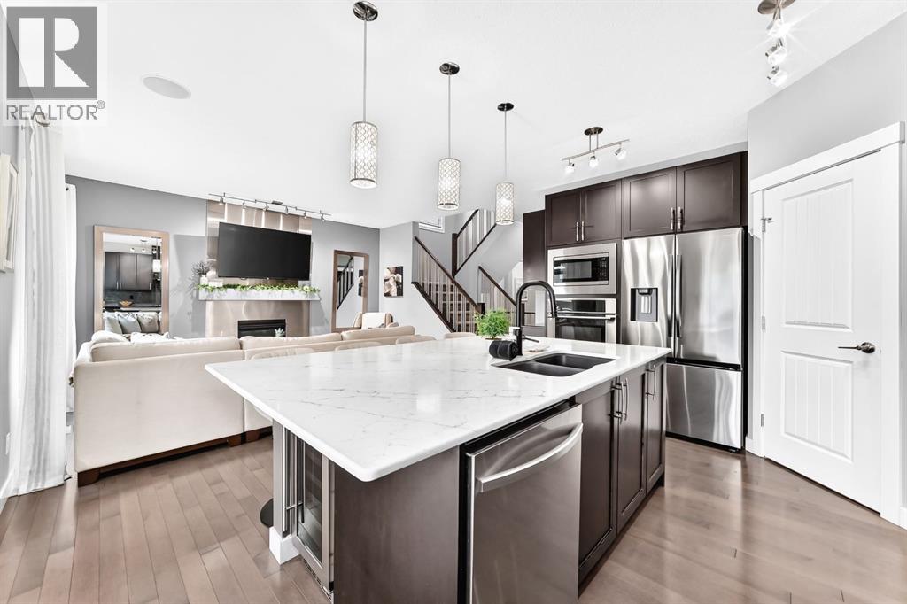 133 Drake Landing Heath, Okotoks, Alberta  T1S 0G8 - Photo 4 - A2335639