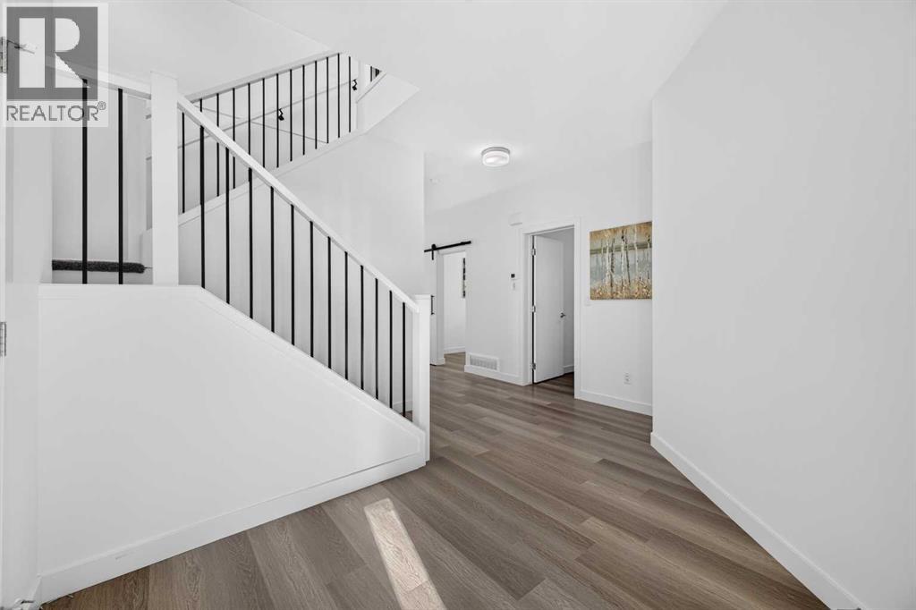 22 Copperhead Bay Se, Calgary, Alberta  T2Z 5H2 - Photo 5 - A2348159