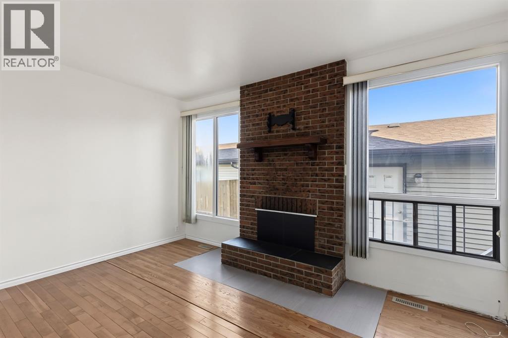 1272 Berkley Drive NW, Calgary, Alberta  T3K 1S9 - Photo 7 - A2342496