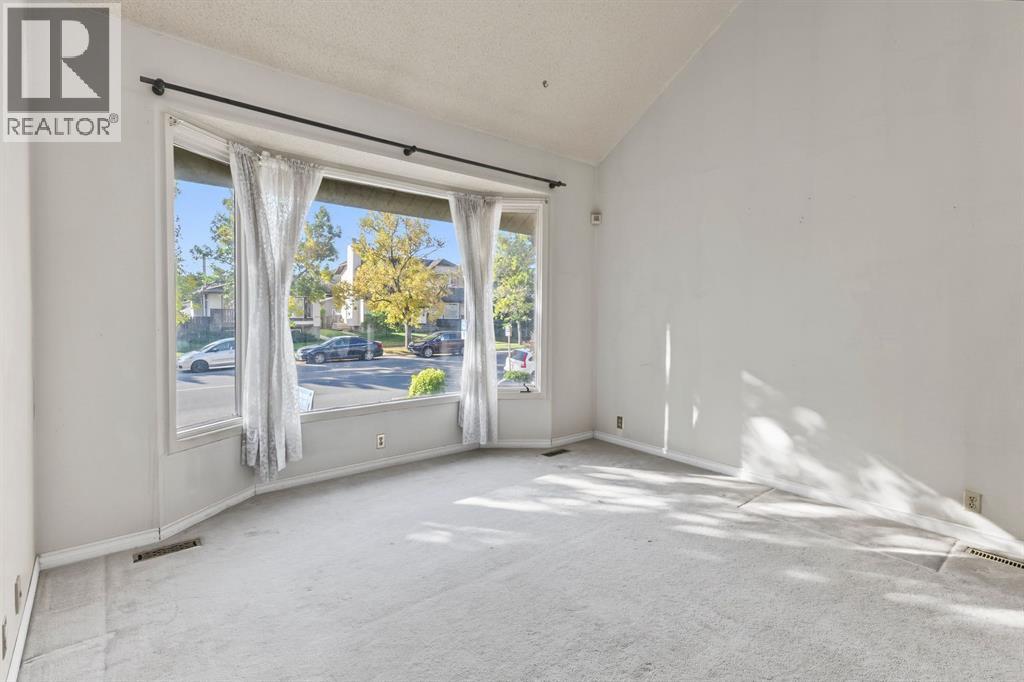 1272 Berkley Drive NW, Calgary, Alberta  T3K 1S9 - Photo 2 - A2342496