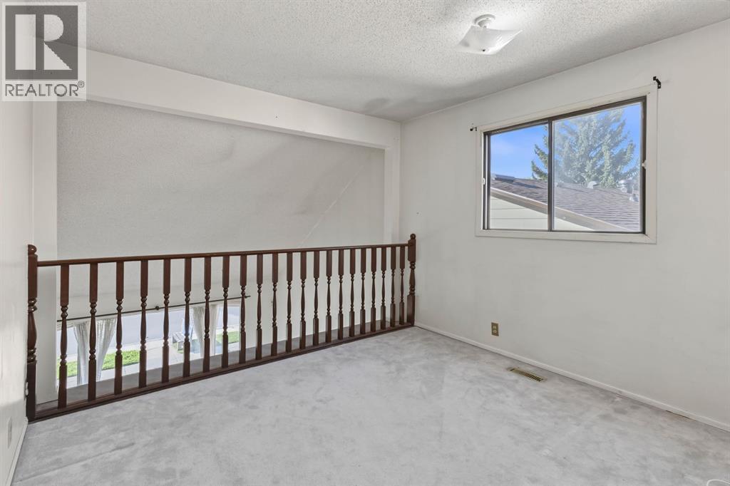 1272 Berkley Drive NW, Calgary, Alberta  T3K 1S9 - Photo 15 - A2342496