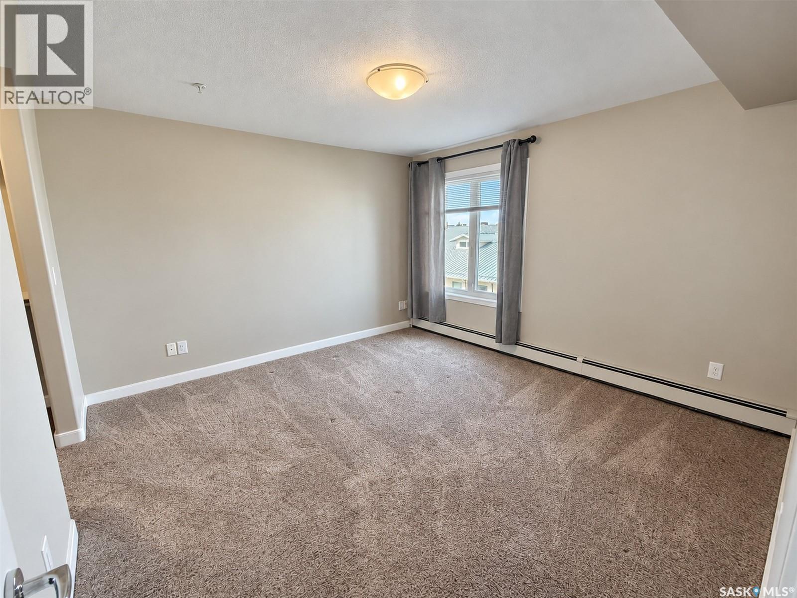 205 2311 Windsor Park Road, Regina, Saskatchewan  S4V 1S2 - Photo 18 - SK049592
