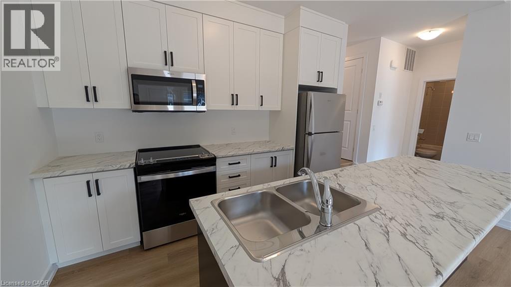 71 Great Falls Boulevard Unit# 53, Hamilton, Ontario  L8B 1Y5 - Photo 3 - 40865436