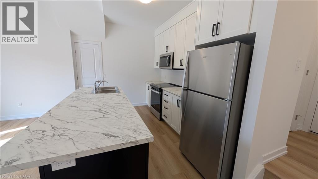 71 Great Falls Boulevard Unit# 53, Hamilton, Ontario  L8B 1Y5 - Photo 4 - 40865436