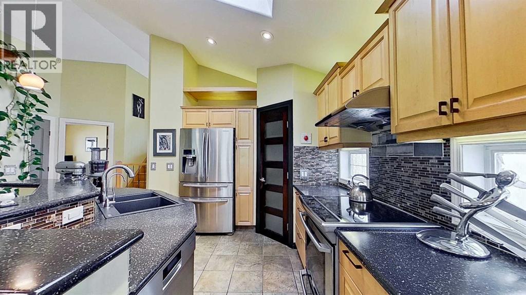 18 Tuscany Meadows Heights NW, Calgary, Alberta  T3L 2L2 - Photo 7 - A2347624