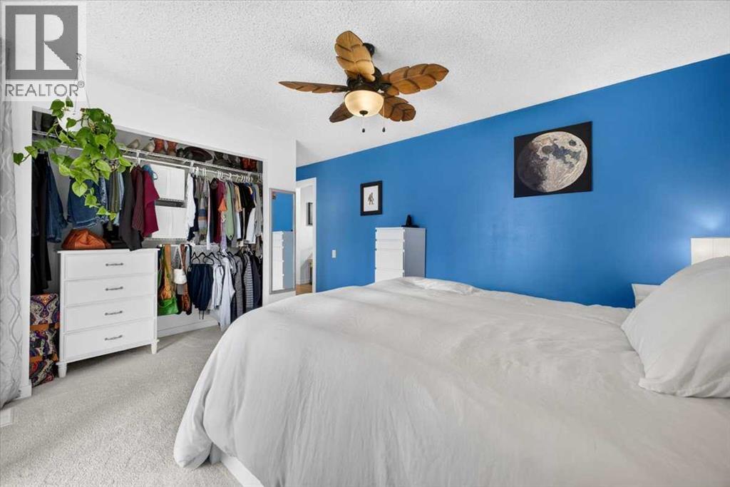 63 Beaconsfield Way NW, Calgary, Alberta  T3K 1W9 - Photo 19 - A2348175