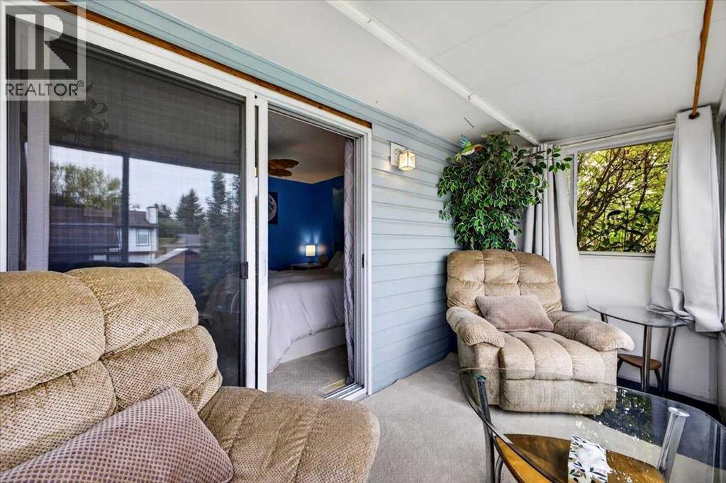 63 Beaconsfield Way NW, Calgary, Alberta  T3K 1W9 - Photo 24 - A2348175