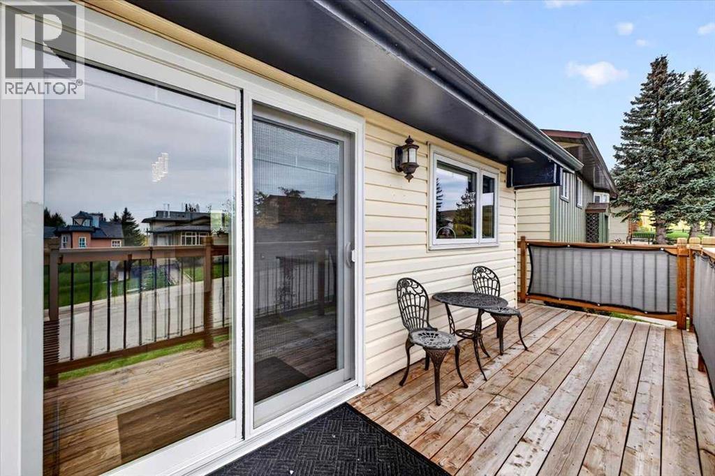 63 Beaconsfield Way NW, Calgary, Alberta  T3K 1W9 - Photo 41 - A2348175