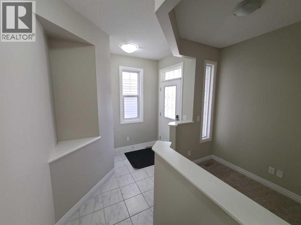 16 Nolancrest Green Nw, Calgary, Alberta  T3R 0P8 - Photo 5 - A2347480