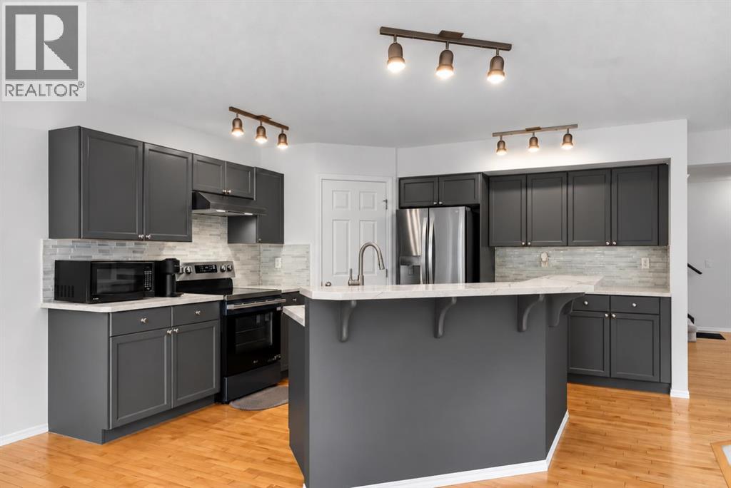 22 Evansbrooke Way NW, Calgary, Alberta  T3P 1C5 - Photo 9 - A2342308