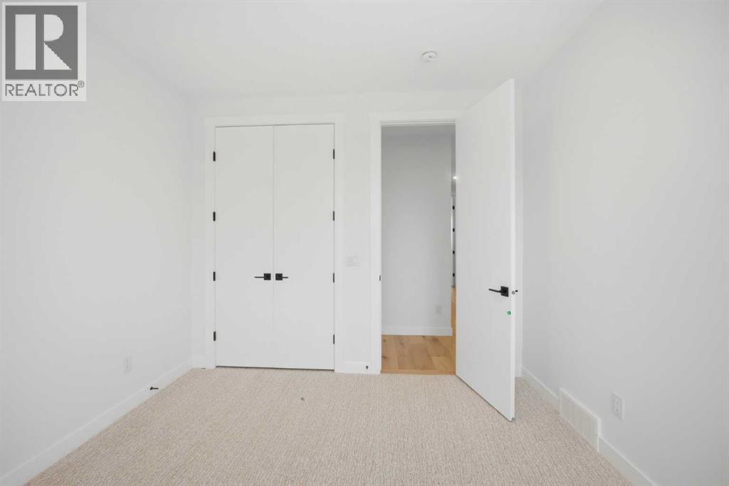 4711 19 Avenue Nw, Calgary, Alberta  T3B 0S5 - Photo 24 - A2347019