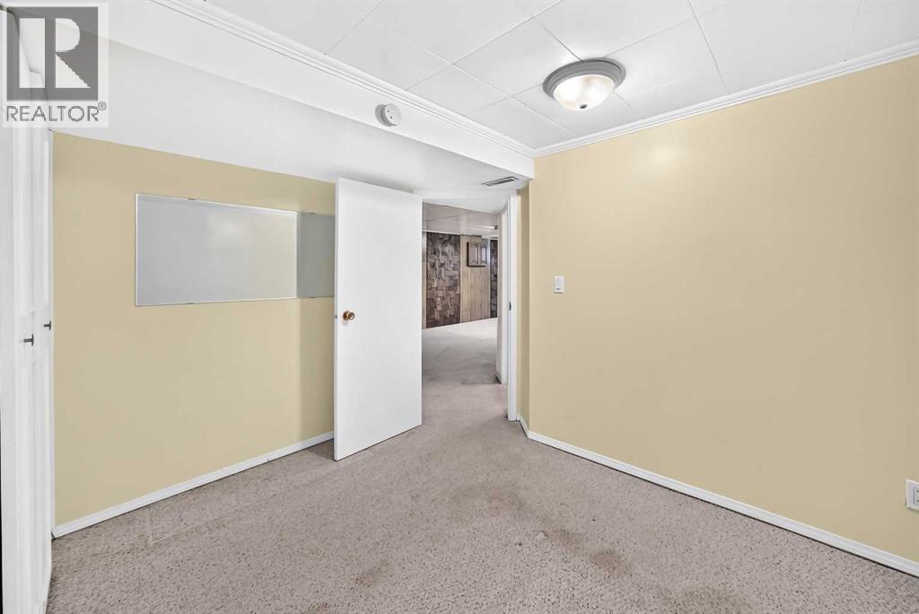 7219 Bow Crescent Nw, Calgary, Alberta  T3B 2C9 - Photo 17 - A2346705