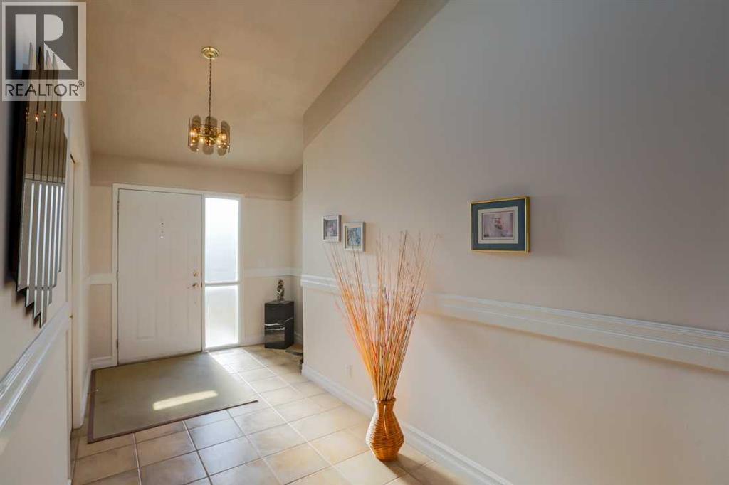 11 Maple Place, Crossfield, Alberta  T0M 0S0 - Photo 3 - A2347246