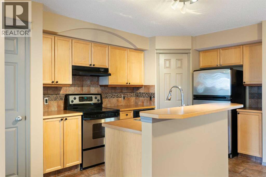 12 Tuscany Springs Circle Nw, Calgary, Alberta  T3L 2K8 - Photo 9 - A2345473