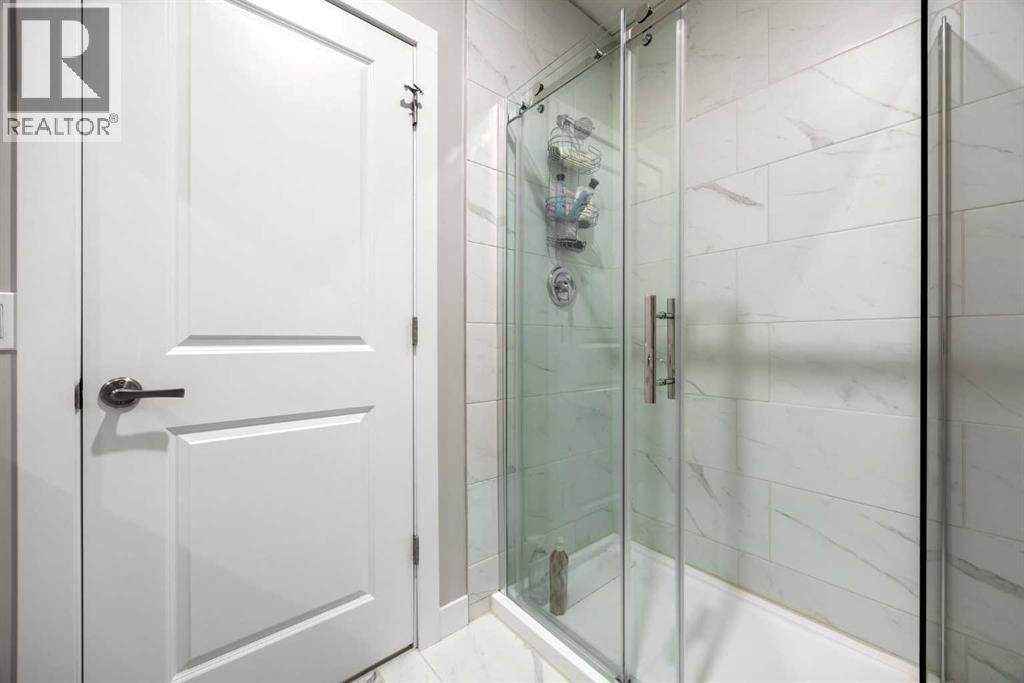 112 Reunion Loop NW, Airdrie, Alberta  T4B 4J6 - Photo 33 - A2347452