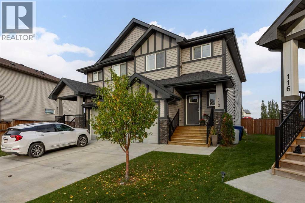 112 Reunion Loop NW, Airdrie, Alberta  T4B 4J6 - Photo 1 - A2347452