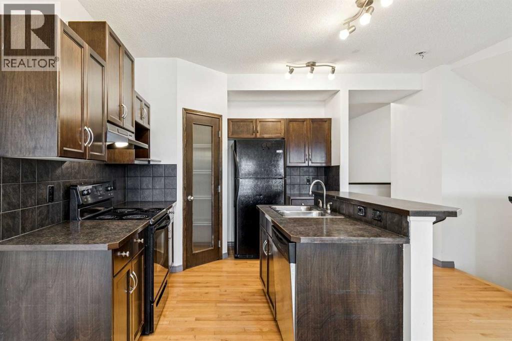118 Heritage Landing, Cochrane, Alberta  T4C 0E3 - Photo 19 - A2345350