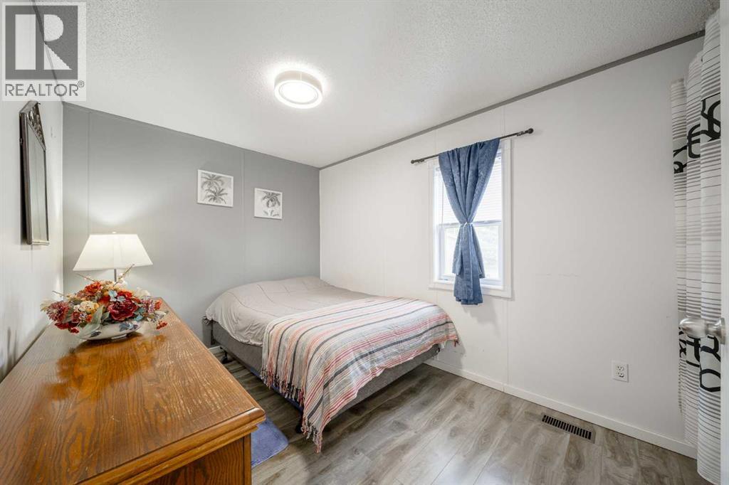 105 Heritage Drive, Okotoks, Alberta  T1S 1M4 - Photo 10 - A2347611