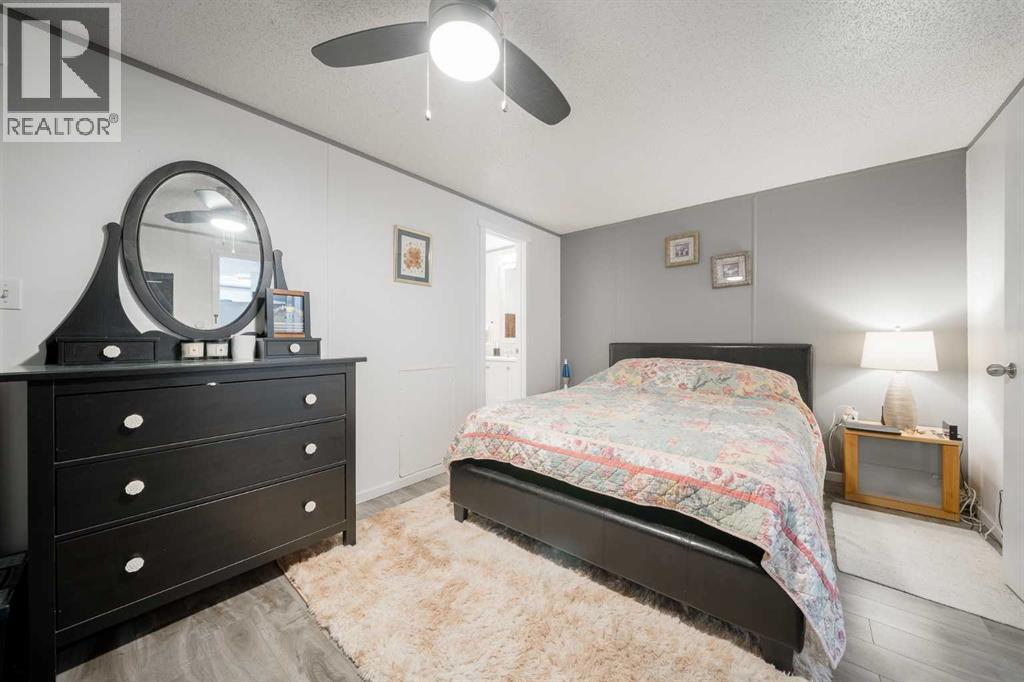 105 Heritage Drive, Okotoks, Alberta  T1S 1M4 - Photo 14 - A2347611