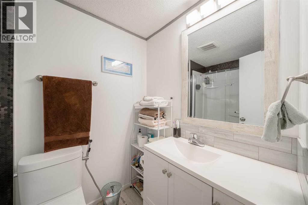 105 Heritage Drive, Okotoks, Alberta  T1S 1M4 - Photo 16 - A2347611