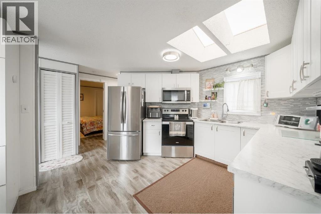 105 Heritage Drive, Okotoks, Alberta  T1S 1M4 - Photo 7 - A2347611