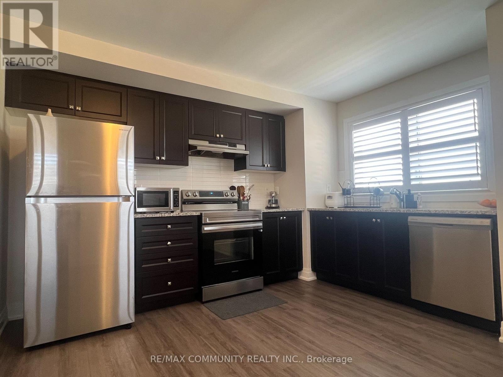 Coach House - 3570 Bur Oak Avenue, Markham, Ontario  L6B 1R8 - Photo 4 - N13832300