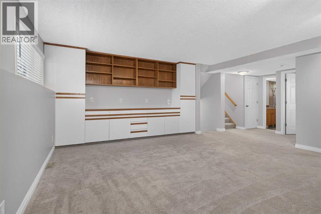 112 Beaconsfield Rise Nw, Calgary, Alberta  T3K 1X4 - Photo 26 - A2347791