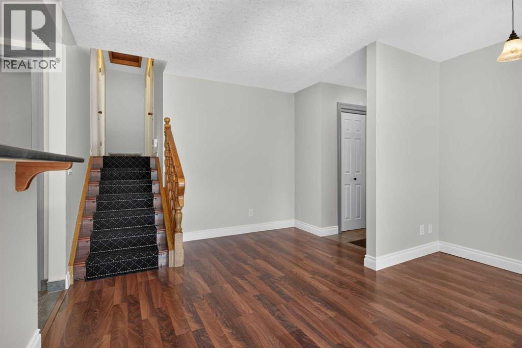 112 Beaconsfield Rise Nw, Calgary, Alberta  T3K 1X4 - Photo 12 - A2347791