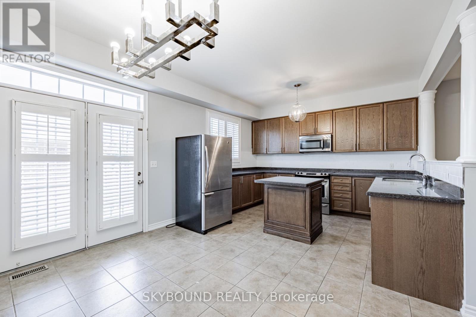 3 - 651 Farmstead Drive, Milton, Ontario  L9T 7W2 - Photo 4 - W13668596