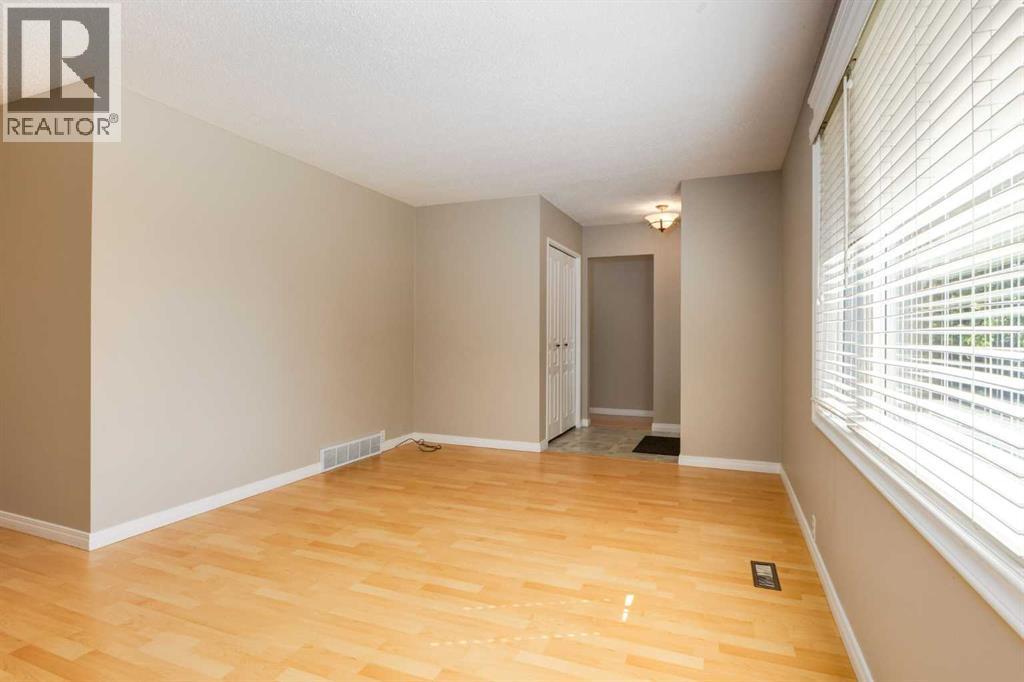 728 Canfield Place Sw, Calgary, Alberta  T2W 1K6 - Photo 6 - A2343353