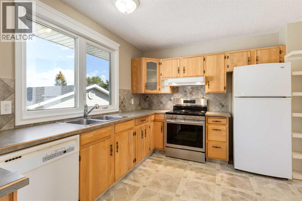 728 Canfield Place Sw, Calgary, Alberta  T2W 1K6 - Photo 10 - A2343353