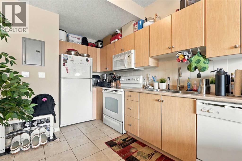 2014, 1053 10 Street SW, Calgary, Alberta  T2R 1S6 - Photo 6 - A2348414