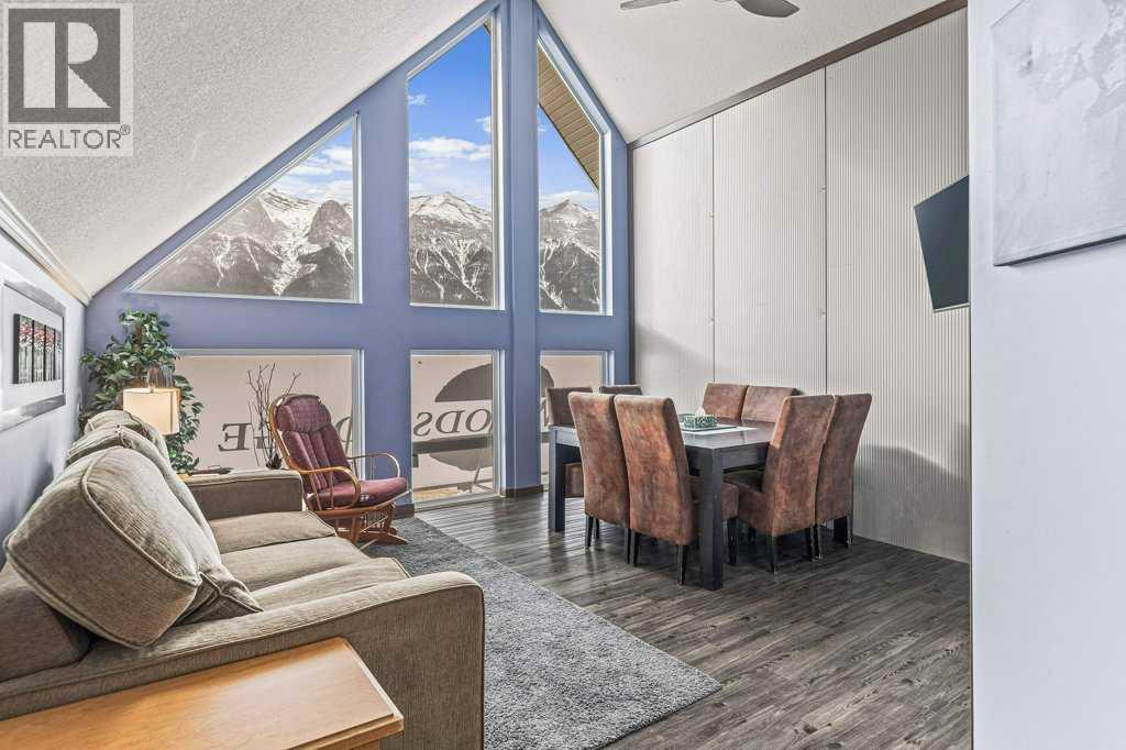 Welcome a truly one of a kind property in the Bow Valley that has 3 self contained units: 1 x 3 bedroom unit, 1 x 4 bedroom unit and a unit with 2 x queen beds in 2 large rooms. All three units combine to make sleeping for around 30 people in total. This is the only property in the Bow Valley that has its own indoor pool & sauna! Enjoy the spectacular SW views from all units that showcase all of the best mountains in the Bow Valley including the Three Sisters, Ha-Ling, the whole of the Rundle Range. The two upper units have vaulted ceilings. There are many upgraded aspects including electronics, some appliances and fully appointed kitchens. There is 2,283 sq.ft. of industrial space the basement including installed an industrial quality washing machines and gas powered dryer. Located just outside Banff National Park, this location is popular for visitors from both Banff, Lake Louise and Canmore, especially since Banff and Lake Louise are almost exclusively hotel only with very few units that have their own kitchens with properties suitable for large groups. Nothing similar exists in Banff or Canmore or Lake Louise that has over 6,400 sq.ft. of potential. This list price is $2,280,000+GST. GST is often deferred and not paid when a buyer is GST registered. (id:48254)