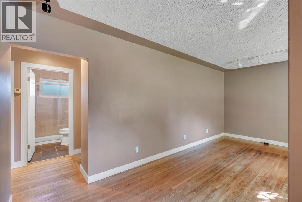 212 Blackthorn Road Nw, Calgary, Alberta  T2K 3S3 - Photo 9 - A2346351