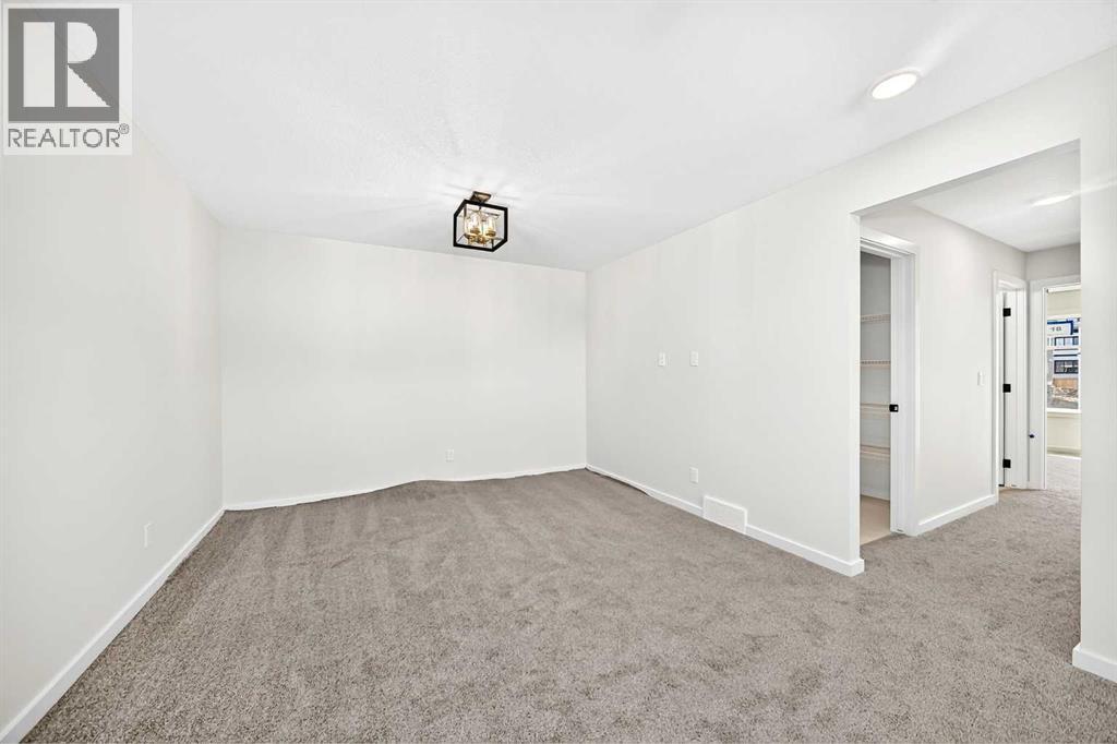 79 Creekside Rise SW, Calgary, Alberta  T2X 6G8 - Photo 28 - A2346255