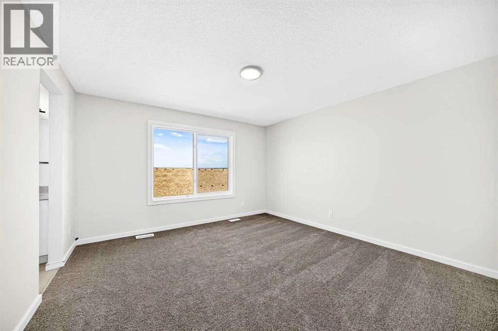 79 Creekside Rise SW, Calgary, Alberta  T2X 6G8 - Photo 29 - A2346255