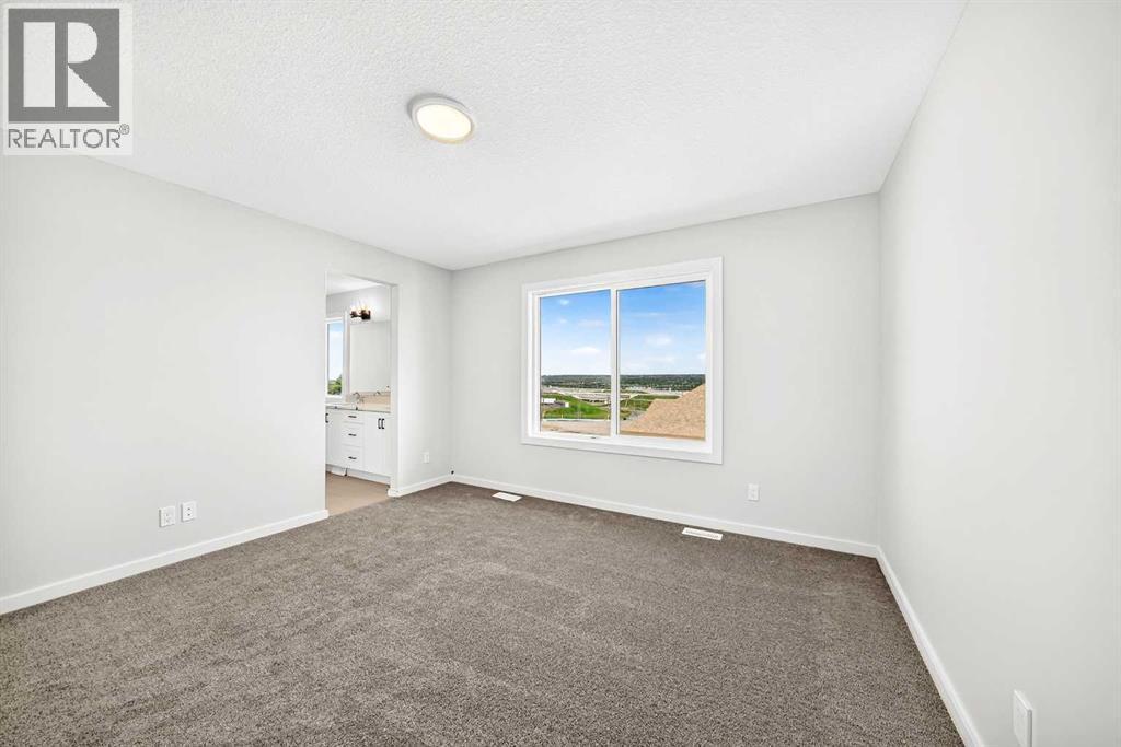 79 Creekside Rise SW, Calgary, Alberta  T2X 6G8 - Photo 30 - A2346255
