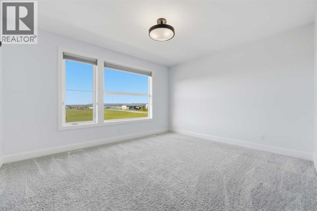 125 South Harmony Drive, Rural Rocky View County, Alberta  T3Z 0C5 - Photo 23 - A2347861
