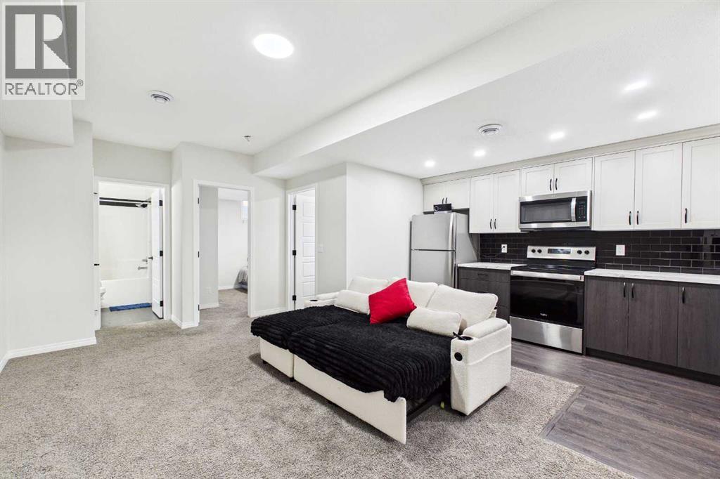24 Rowmont Common Nw, Calgary, Alberta  T3L 0L3 - Photo 32 - A2345530