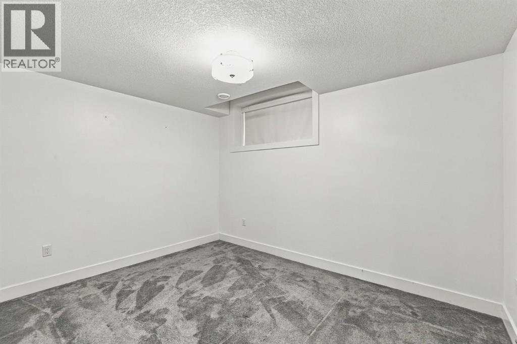 1458 Richland Road NE, Calgary, Alberta  T3e 5m6 - Photo 37 - A2348492