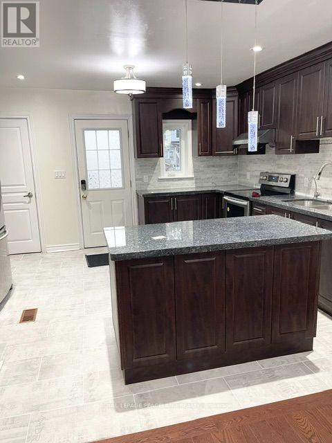 606 Coxwell Avenue, Toronto, Ontario  M4C 3B6 - Photo 7 - E13833632