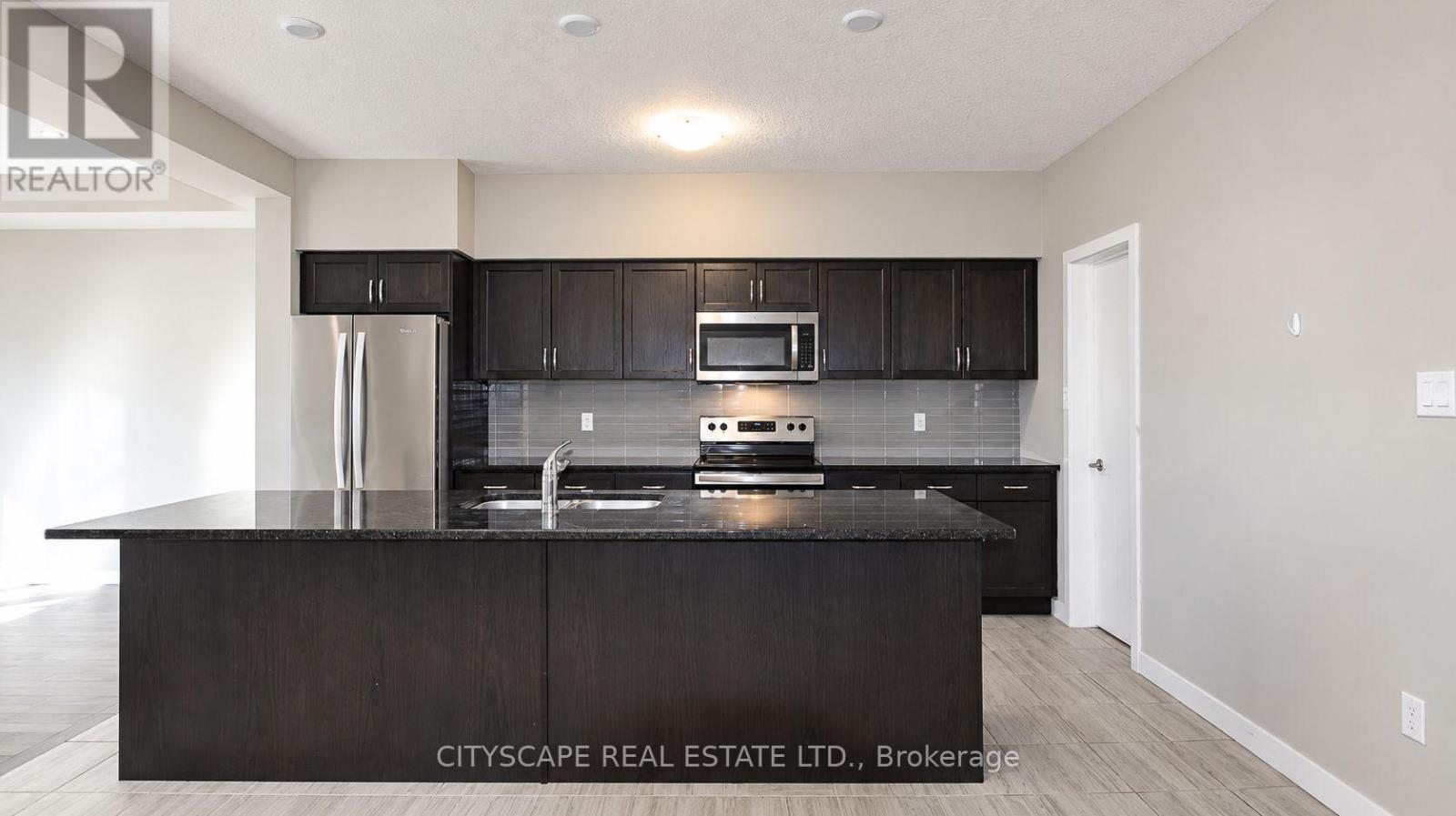 908 Robert Ferrie Drive, Kitchener, Ontario  N2R 0P2 - Photo 6 - X13828446
